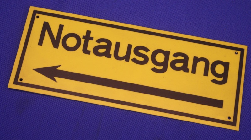 Hinweischild Notausgang nach links ca. 25x10cm gelb
