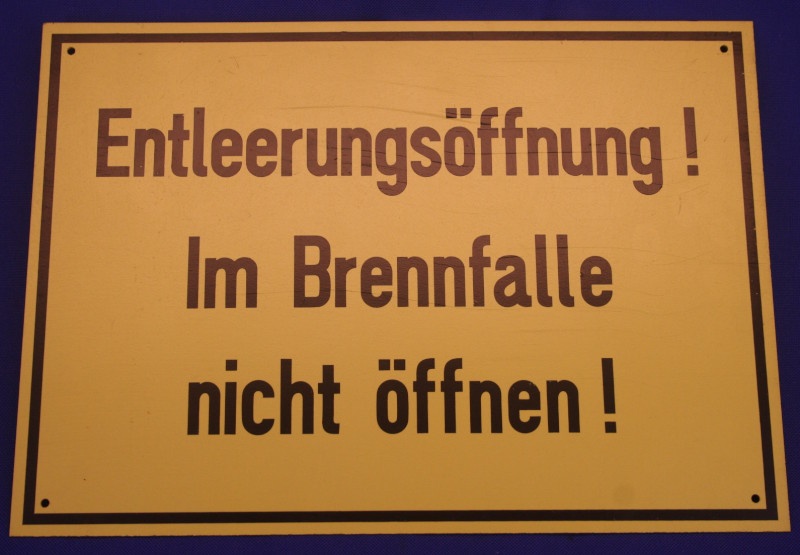 Hinweisschild Entleerungs&ouml;ffnung im Brennf gelb ca. 35x25 cm