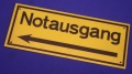 Hinweischild Notausgang nach links ca. 25x10cm gelb